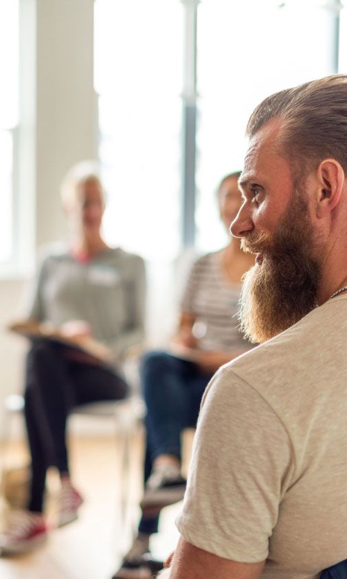 Veterinary professionals gathered in a community support group