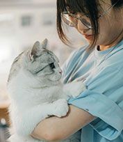 Veterinarian consoling a pet owner